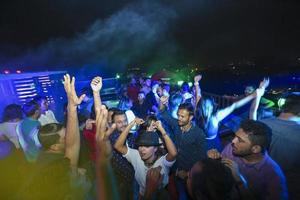 Bangladesh, October 23, 2015, People dancing and enjoying DJ Party at Picasso Restaurant in Capital city of Dhaka. photo