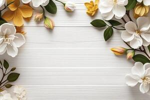 Spring flowers over white wooden background with copy space text area. photo