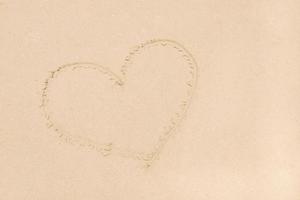 sand beach as heart shape photo