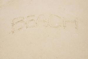 arena playa con texto foto