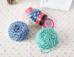 Colorful ribbons of different colors and sizes in a shop window photo