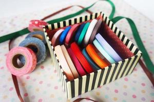a few rolls of colorful ribbon for crafting, handmade items and DIY photo
