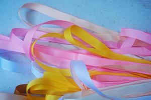 a few rolls of colorful ribbon for crafting, handmade items and DIY photo