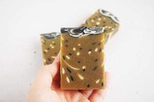 Handmade soap bars on a white background. Selective focus. photo