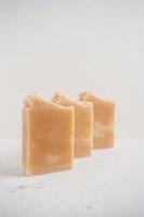 Handmade soap bars on a white background. Selective focus. photo