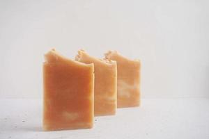 Handmade soap bars on a white background. Selective focus. photo