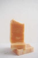Handmade soap bars on a white background. Selective focus. photo