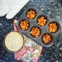 Baking muffins with pumpkin, carrot, bell pepper and cheese photo