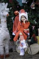 Portrait of little girl in christmas festival,Asian kid winter holiday photo