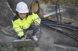 Telecommunication engineers work at cell towers for 5G cell phone signals,Network tower maintenance technicians photo