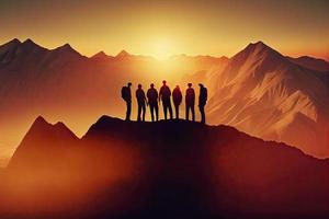 Team success concept photo, friends standing together on the top of the hill, over beautiful mountains landscape in gold sunset light photo