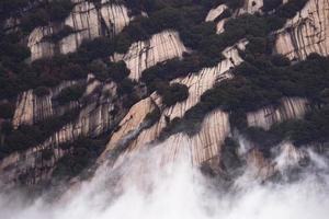 Huashan mountain. The highest of China five sacred mountains, called the West Mountain,well known for steep trails, breath-taking cliffs and grand scenery photo