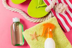Summer bag background with copy space. Flat lay photo on color table, travel concept. Free space for text, mock-up