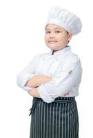 cute boy chef stand and smile isolated photo