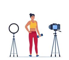 Woman dressed in sports clothes does exercises with dumbbells recording video with camera on tripod. Social network blogging, healthy lifestyle concept. Sport streming. Vector illustration.