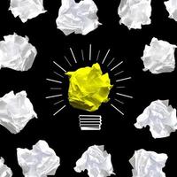 Light Bulb Icon Made with Crumpled Paper - Idea, Creativity Concept photo