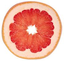 Round piece of grapefruit on a white isolated background, top view photo