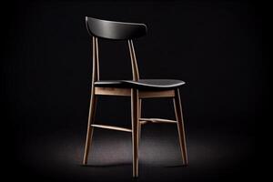 Wooden chair on a black background. Furniture for the kitchen. photo