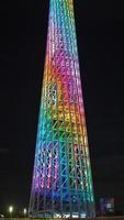 Guangzhou City, China, 2022 - The beautiful sightseeing tower view with the colorful lights on at night photo