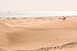 Sand dunes by the sea photo