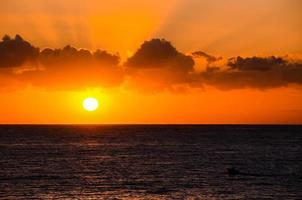 Sunset over the sea photo