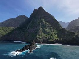 Breathtaking view of towering cliffs and ocean in Madeira, Portugal photo