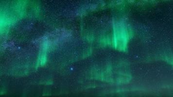 the video record is very beautiful aurora clouds in winter at night filled with stars in the sky
