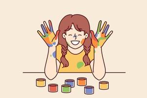 Positive girl with face and palms smeared with multi-colored paint smiles, wanting to become artist or designer. Smiling girl with gouache or watercolor on hands rejoices at school art lesson vector