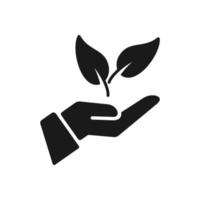 Hand holding plant with leaves vector icon