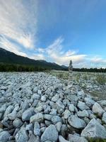 Pyramid of stones at the site of the descent of a stone mudflow, Sayan Mountains, Russia photo