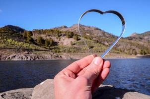 Heart and mountain landscape photo