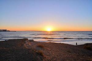 Sunset over the sea photo