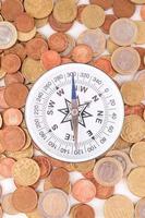 Compass and coins photo