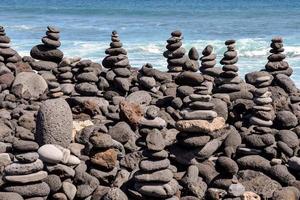 Stacked stones on the coast photo