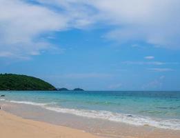 Beautiful Landscape viewpoint for design postcard and calendar  tropical rock beach front view sea blue sky overlooking Nang Ram Beach Sattahip Bay Chonburi Thailand On clear day white cloud holiday photo