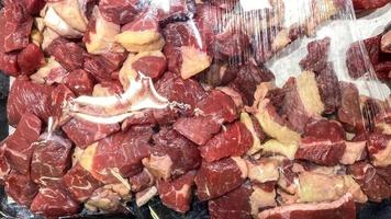 beef that is cut into pieces, looks fresh, in a container and ready to be cooked on Eid al Adha idul qurban photo