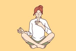 Woman meditates with hand on heart and wishes to heal herself through yoga and Buddhist spiritual practices. Girl sitting in lotus position takes care of heart chakra and relaxes during yoga vector