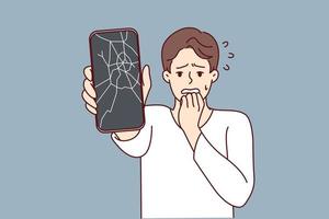 Man reacts emotionally to broken phone by bringing hand to mouth and experiencing shock due to breakdown. Guy with broken smartphone needs to replace display matrix by service center employees vector