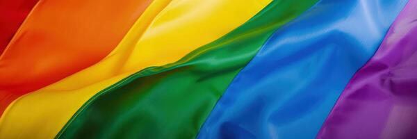 Waving rainbow flag as LGBT diversity banner or header. . photo