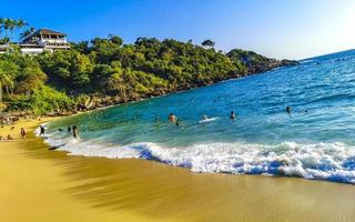 Puerto Escondido Oaxaca Mexico 2022 Beach sand blue water huge surfer waves Carrizalillo Puerto Escondido. photo