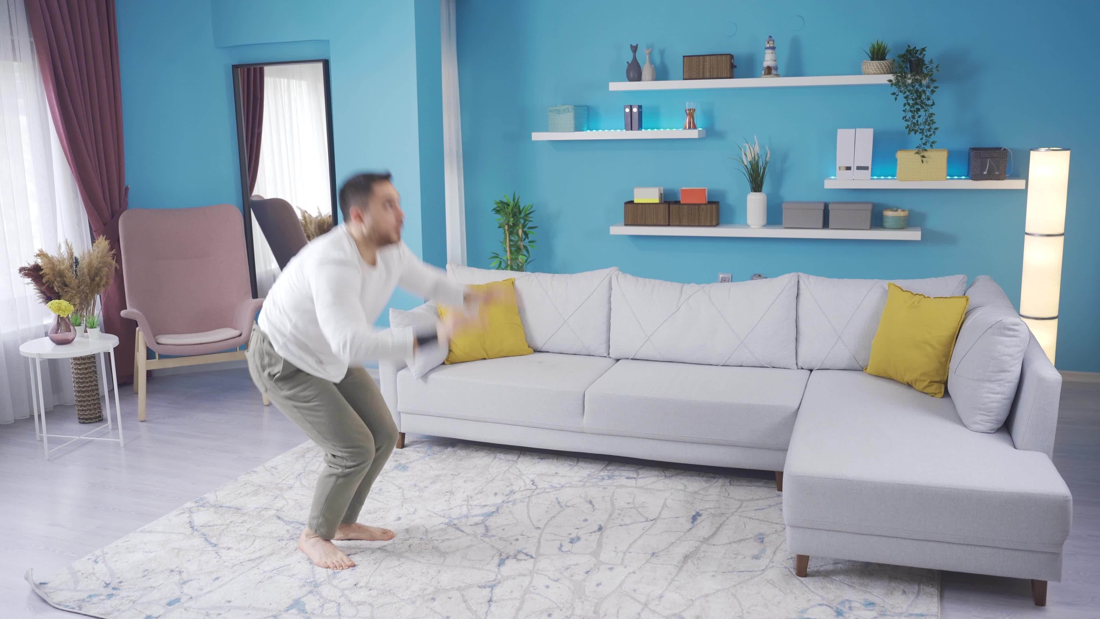 Young Man With Fit Body Doing Burpee To Build Muscles At Home Young young-man-with-fit-body-doing-burpee-to-build-muscles-at-home-young