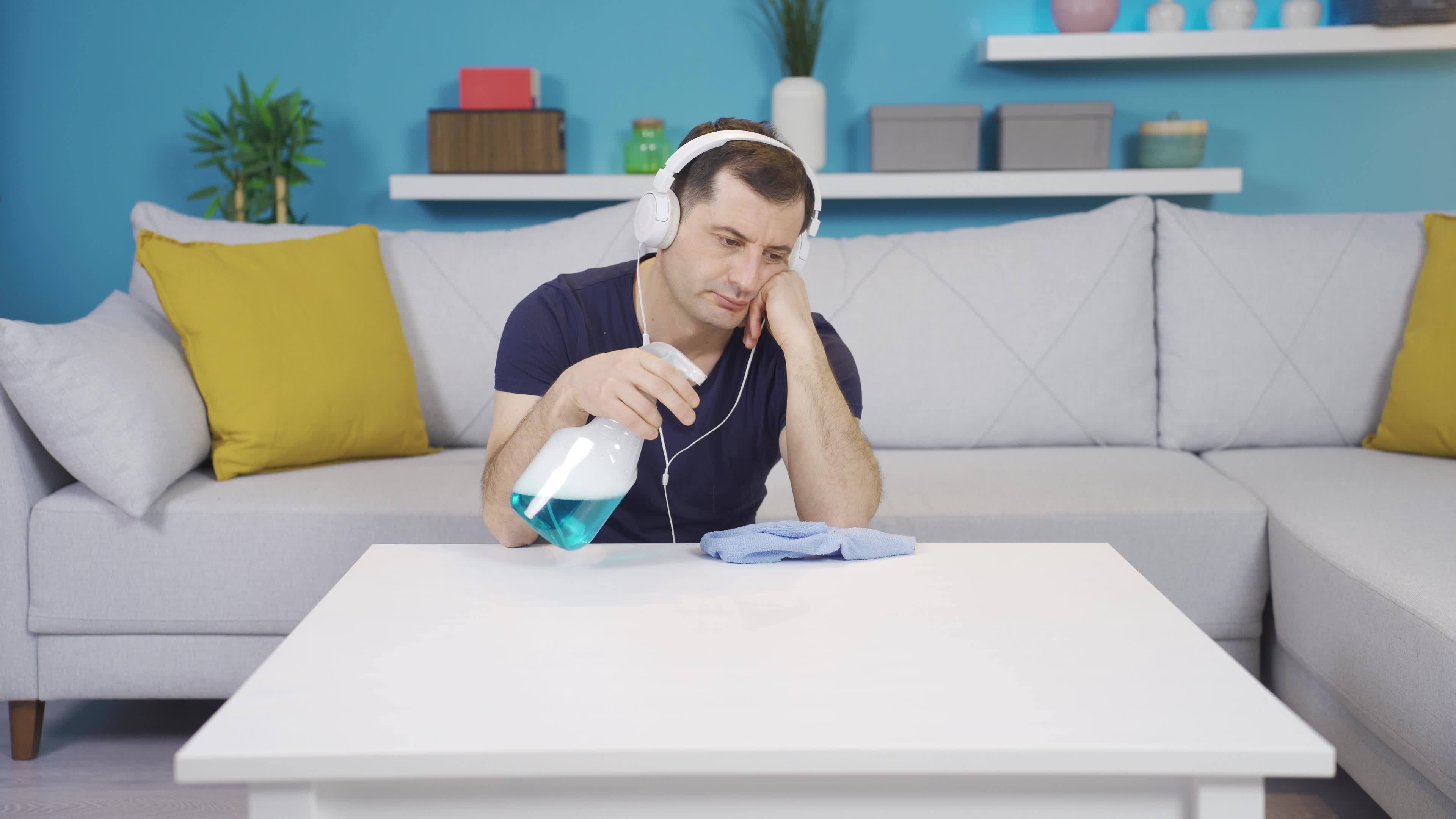 House Cleaning man is thoughtful and depressed. 21940678 Stock Video at