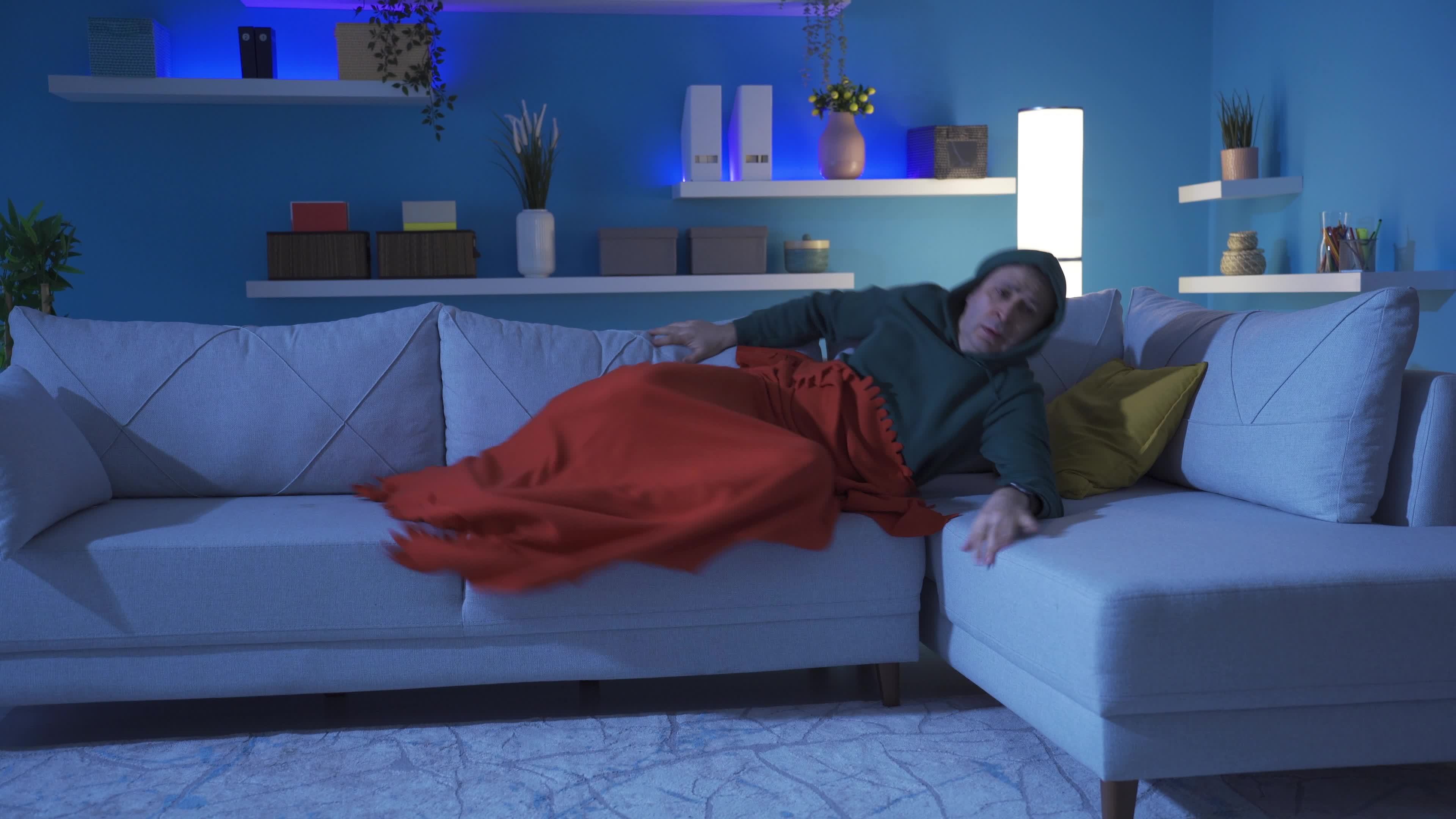 Man having nightmares in his sleep. Man sleeping alone in dark room has