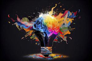 Creative light bulb explodes with colorful paint and splashes  Think differently creative idea concept photo