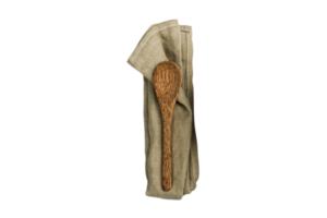 Green napkin and wooden spoon isolated on a transparent background png