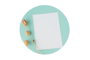 Blue plate with white paper and dried flowers isolated on a transparent background png