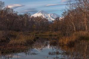 Reflection of Avach volcano in Kamchatka photo