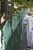 Iron fence, Natural background, Garden wall in a graveyard, heritage building photo