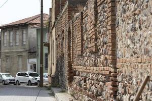 Old brick house in the old town of Balikesir, Old brick wall in the city of Turkey photo