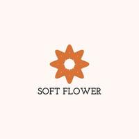 The floral logo is an octagram in orange color. vector